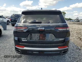 2023 Jeep Grand Cherokee Summit Reserve with VIN 1C4RJKEG5P8853916, listed as a Copart auction lot 52691735 with 18,899 mi miles and Salvage title. Bid and sale history available at DreamBid. Image 6.