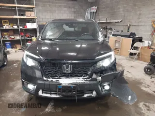 2020 Honda Passport EX-L with VIN 5FNYF8H53LB013931, listed as a IAAI auction lot 41614095 with 68,537 mi miles and . Bid and sale history available at DreamBid. Image 12.