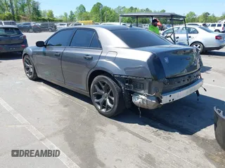 2022 Chrysler 300 S with VIN 2C3CCABG1NH259933, listed as a IAAI auction lot 42056429 with 51,327 mi miles and . Bid and sale history available at DreamBid. Image 3.