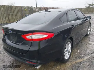 2013 Ford Fusion SE with VIN 3FA6P0H71DR104984, listed as a IAAI auction lot 42026134 with 198,012 mi miles. Bid and sale history available at carsss.com. Image 4.