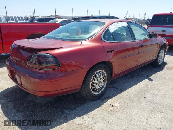 2000 Pontiac Grand Prix SE with VIN 1G2WJ52K3YF262773, listed as a IAAI auction lot 42031719 with 164,284 mi miles. Bid and sale history available at carsss.com. Image 4.