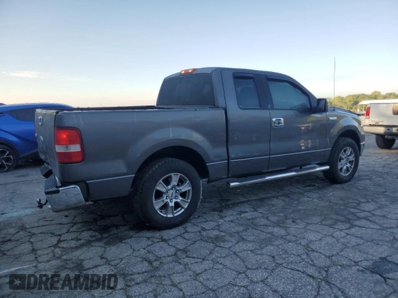 2004 Ford F-150 XLT with VIN 1FTRX12514KD37885, listed as a Copart auction lot 73998724 with 164,189 mi miles and Salvage Title. Bid and sale history available at carsss.com. Image 3.