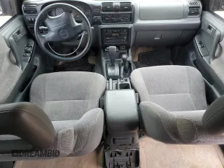 1999 Isuzu Rodeo S with VIN 4S2CM58W8X4314512, listed as a Copart auction lot 55467544 with 227,541 mi miles and Salvage Title. Bid and sale history available at carsss.com. Image 8.