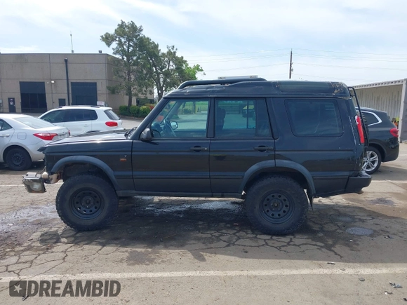2004 Land Rover Discovery SE with VIN SALTW19464A860565, listed as a IAAI auction lot 42019860 with 153,274 mi miles. Bid and sale history available at carsss.com. Image 15.