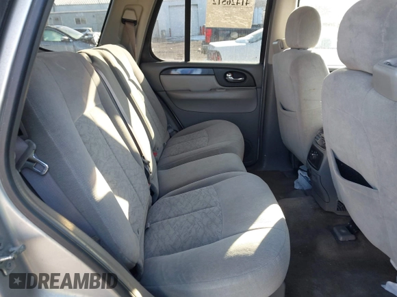 2005 GMC Envoy SLE with VIN 1GKDT13S452194933, listed as a IAAI auction lot 41426512 with 176,897 mi miles. Bid and sale history available at carsss.com. Image 8.