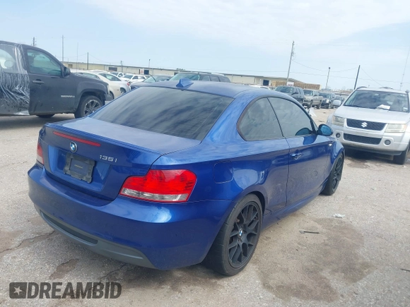 2008 BMW 1 Series 135i with VIN WBAUC73598VF23878, listed as a IAAI auction lot 41569879 with 186,622 mi miles. Bid and sale history available at carsss.com. Image 4.