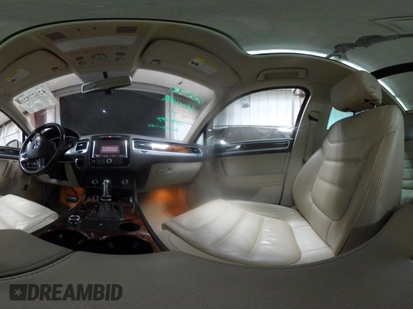 2012 Volkswagen Touareg Sport with VIN WVGFK9BP2CD002991, listed as a IAAI auction lot 42077523 with 94,515 mi miles and . Bid and sale history available at DreamBid. Image 18.