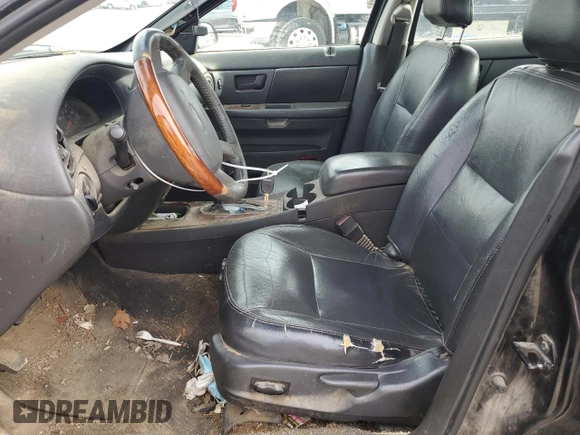 2005 Ford Taurus SEL z VIN 1FAFP56S65A150519, wystawiony jako Copart lot #54002315 z przebiegiem Nie podano mil oraz Szkoda całkowita • Salvage title. Historia ofert i sprzedaży dostępna na DreamBid. Obrazek 7.
