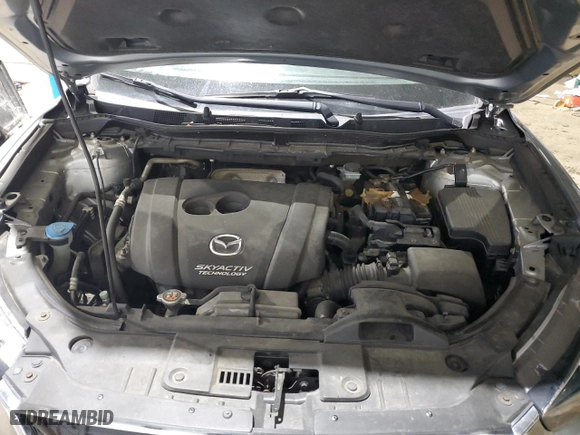 2014 Mazda CX-5 Touring with VIN JM3KE2CY1E0321454, listed as a Copart auction lot 45710035 with 134,378 mi miles and Salvage Title. Bid and sale history available at carsss.com. Image 12.