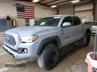2019 Toyota Tacoma SR z VIN 3TMCZ5AN5KM237724, wystawiony jako Copart lot #55863675 z przebiegiem 96 662 mil mil oraz Szkoda całkowita • Salvage title. Historia ofert i sprzedaży dostępna na DreamBid. Obrazek 1.