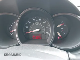 2015 Kia Rio LX with VIN KNADM5A34F6517123, listed as a IAAI auction lot 42125593 with 138,214 mi miles. Bid and sale history available at carsss.com. Image 7.