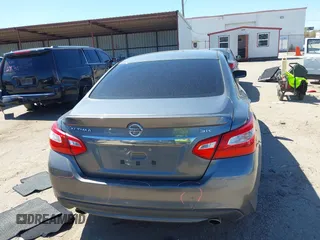 2016 Nissan Altima SR with VIN 1N4AL3AP1GC285363, listed as a IAAI auction lot 41754598 with 121,923 mi miles and . Bid and sale history available at carsss.com. Image 16.