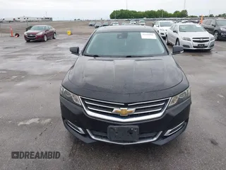 2015 Chevrolet Impala LT z VIN 1G1125S32FU110853, wystawiony jako IAAI lot #42336995 z przebiegiem 232 619 mil mil oraz . Historia ofert i sprzedaży dostępna na DreamBid. Obrazek 6.