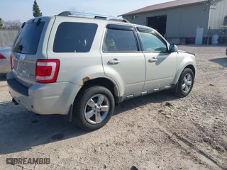 2009 Ford Escape Limited with VIN 1FMCU94G19KC58313, listed as a IAAI auction lot 41989227 with 115,188 mi miles. Bid and sale history available at carsss.com. Image 4.