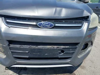 2015 Ford Escape Titanium with VIN 1FMCU0J94FUB24350, listed as a IAAI auction lot 42065641 with 168,215 mi miles. Bid and sale history available at carsss.com. Image 6.