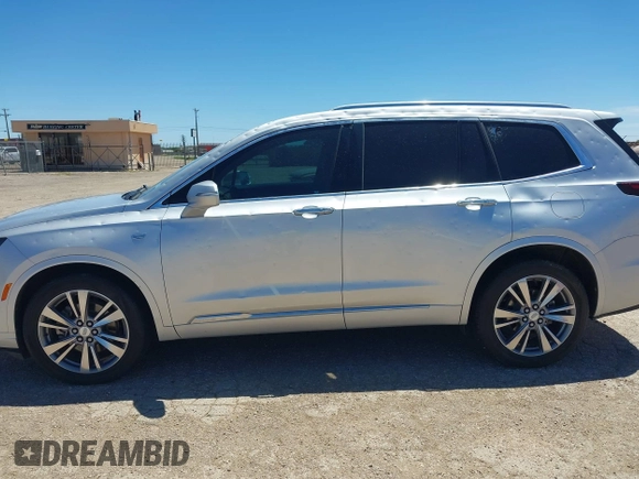 2020 Cadillac XT6 FWD Premium Luxury with VIN 1GYKPCRS7LZ104392, listed as a IAAI auction lot 42278675 with 81,001 mi miles and . Bid and sale history available at DreamBid. Image 14.