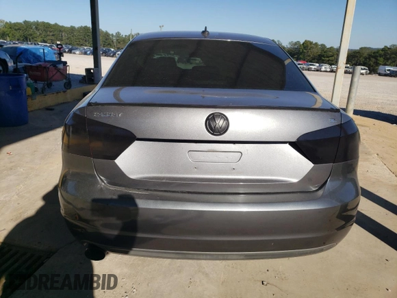 2014 Volkswagen Passat SE z VIN 1VWBP7A35EC004425, wystawiony jako Copart lot #75839254 z przebiegiem 185 176 mil mil oraz Szkoda całkowita • Salvage title. Historia ofert i sprzedaży dostępna na DreamBid. Obrazek 6.