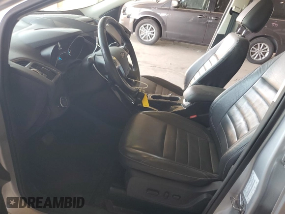 2015 Ford Escape Titanium with VIN 1FMCU9J96FUB33670, listed as a Copart auction lot 61826915 with 179,794 mi miles and Salvage title. Bid and sale history available at DreamBid. Image 7.