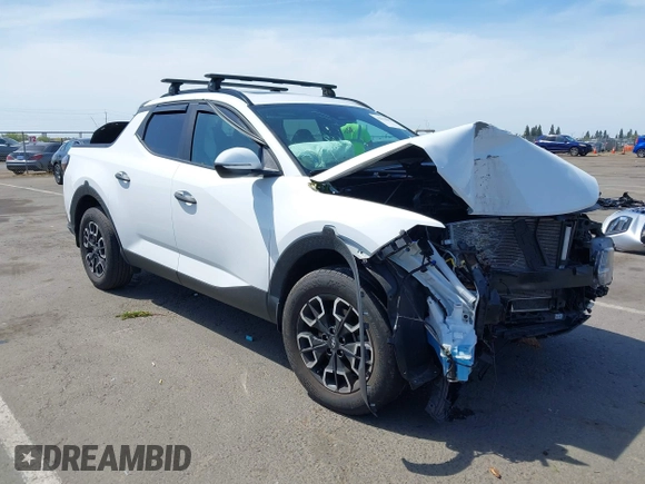 2022 Hyundai Santa Cruz SEL z VIN 5NTJC4AE4NH036346, wystawiony jako IAAI lot #42154082 z przebiegiem 37 402 mil mil oraz . Historia ofert i sprzedaży dostępna na DreamBid. Obrazek 1.