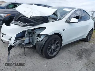 2024 Tesla Model Y with VIN 7SAYGDED2RF207783, listed as a IAAI auction lot 41758143 with Not Provided miles and . Bid and sale history available at DreamBid. Image 19.