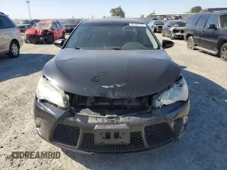 2015 Toyota Camry LE z VIN 4T1BD1FK0FU158184, wystawiony jako Copart lot #55705715 z przebiegiem 158 167 mil mil oraz Szkoda całkowita • Salvage title. Historia ofert i sprzedaży dostępna na DreamBid. Obrazek 5.