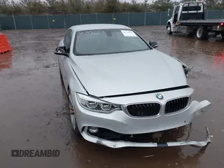 2014 BMW 4 Series 428i with VIN WBA3V5C51EJ968657, listed as a IAAI auction lot 41718019 with 111,083 mi miles and . Bid and sale history available at DreamBid. Image 1.