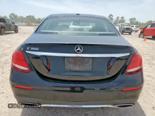 2017 Mercedes-Benz E 300 Luxury with VIN WDDZF4JB8HA123652, listed as a Copart auction lot 57050205 with 105,048 mi miles and Salvage title. Bid and sale history available at DreamBid. Image 6.