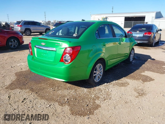 2014 Chevrolet Sonic LT z VIN 1G1JC5SH3E4219619, wystawiony jako IAAI lot #41208791 z przebiegiem 122 161 mil mil oraz . Historia ofert i sprzedaży dostępna na DreamBid. Obrazek 4.