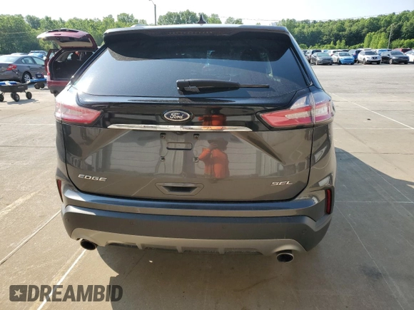 2020 Ford Edge SEL с VIN 2FMPK3J97LBB58552, выставлен на аукционе Copart как лот 58472995 с пробегом 71 387 миль миль и Списание • Salvage title. История ставок и продаж доступна на DreamBid. Изображение 6.