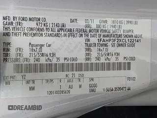 2012 Ford Focus SE with VIN 1FAHP3F2XCL122141, listed as a IAAI auction lot 42008877 with 122,743 mi miles. Bid and sale history available at carsss.com. Image 9.