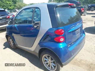 2009 Smart fortwo Pure with VIN WMEEJ31X79K210162, listed as a IAAI auction lot 42715203 with 95,089 mi miles and . Bid and sale history available at DreamBid. Image 3.