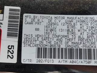 2013 Toyota Tacoma with VIN 3TMLU4EN3DM106670, listed as a IAAI auction lot 41696618 with 176,353 mi miles and . Bid and sale history available at DreamBid. Image 9.