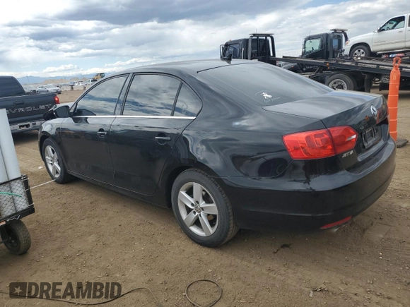2014 Volkswagen Jetta TDI w/Premium with VIN 3VW3L7AJ9EM438697, listed as a Copart auction lot 57641645 with 191,231 mi miles and Salvage title. Bid and sale history available at DreamBid. Image 2.