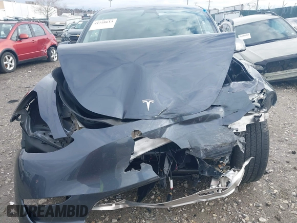 2023 Tesla Model Y Long Range with VIN 7SAYGDEE6PF824173, listed as a IAAI auction lot 41728613 with Not Provided miles and . Bid and sale history available at DreamBid. Image 12.