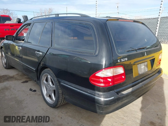 2001 Mercedes-Benz E-Class with VIN WDBJH65JX1B290284, listed as a IAAI auction lot 41713265 with 1 mi miles. Bid and sale history available at carsss.com. Image 3.