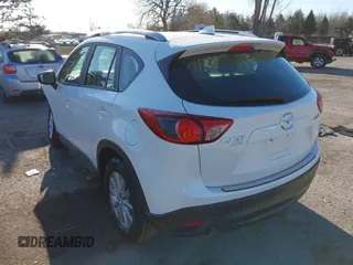 2016 Mazda CX-5 Sport with VIN JM3KE4BY8G0605504, listed as a IAAI auction lot 41866173 with 91,797 mi miles. Bid and sale history available at carsss.com. Image 3.