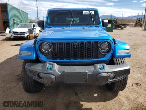2024 Jeep Wrangler Sahara with VIN 1C4RJXP60RW163829, listed as a Copart auction lot 57182365 with 16,873 mi miles and Salvage title. Bid and sale history available at DreamBid. Image 5.
