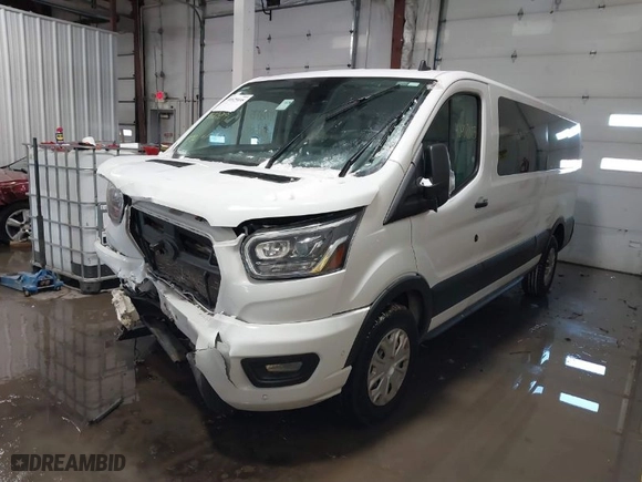 2023 Ford Transit Passenger Wagon XL with VIN 1FBAX2YGXPKA45186, listed as a IAAI auction lot 41625035 with 42,174 mi miles. Bid and sale history available at carsss.com. Image 2.