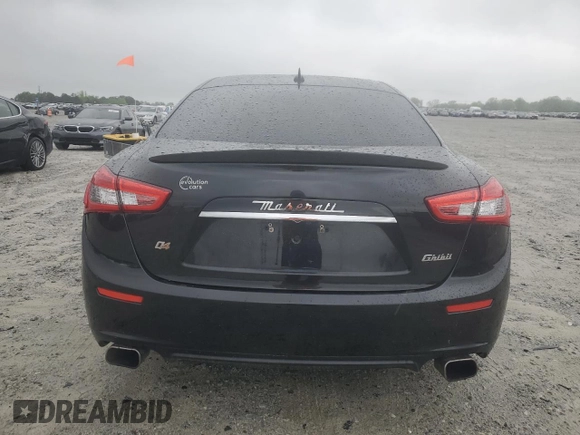 2015 Maserati Ghibli z VIN ZAM57XSA6F1158678, wystawiony jako Copart lot #51920245 z przebiegiem 87 158 mil mil oraz Czysty tytuł • Clean title. Historia ofert i sprzedaży dostępna na DreamBid. Obrazek 6.