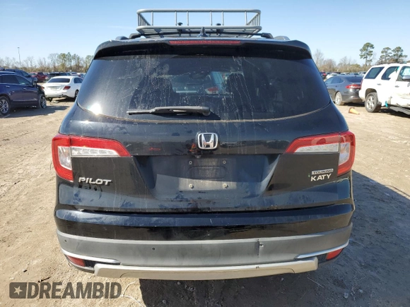 2019 Honda Pilot Touring 7-Passenger z VIN 5FNYF5H69KB019903, wystawiony jako Copart lot #43598805 z przebiegiem 144 486 mil mil oraz Szkoda całkowita • Salvage title. Historia ofert i sprzedaży dostępna na DreamBid. Obrazek 6.