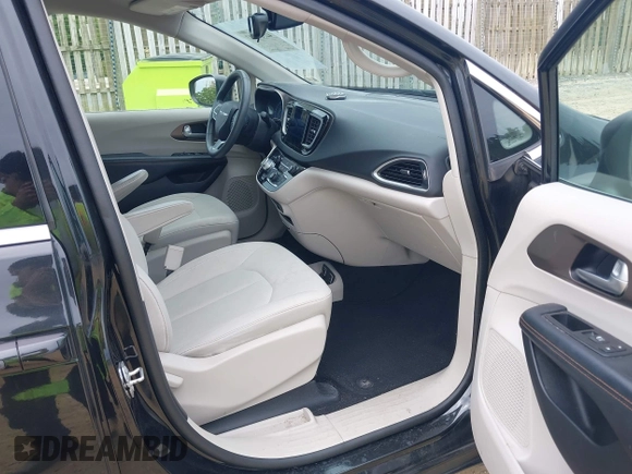 2017 Chrysler Pacifica Touring with VIN 2C4RC1DG8HR502333, listed as a IAAI auction lot 42357607 with 105,266 mi miles and . Bid and sale history available at DreamBid. Image 5.