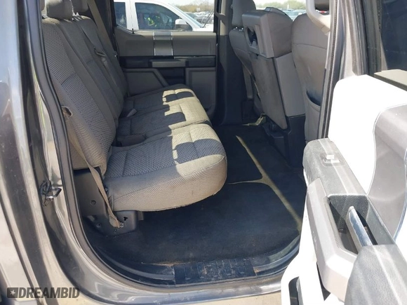 2015 Ford F-150 XLT w/HD Payload Pkg with VIN 1FTFW1EF7FKD04869, listed as a IAAI auction lot 41664736 with 165,784 mi miles. Bid and sale history available at carsss.com. Image 8.