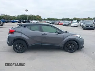 2021 Toyota C-HR LE with VIN JTNKHMBX3M1120177, listed as a IAAI auction lot 41257866 with 43,964 mi miles. Bid and sale history available at carsss.com. Image 13.