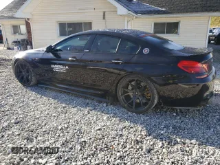 2016 BMW M6 z VIN WBS6E9C55GGF92564, wystawiony jako Copart lot #80727014 z przebiegiem 10 831 mil mil oraz Szkoda całkowita • Salvage title. Historia ofert i sprzedaży dostępna na DreamBid. Obrazek 2.