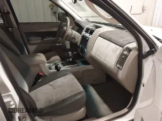 2011 Mercury Mariner Premier with VIN 4M2CN9HG3BKJ02026, listed as a IAAI auction lot 40254703 with 99,000 mi miles and . Bid and sale history available at DreamBid. Image 5.