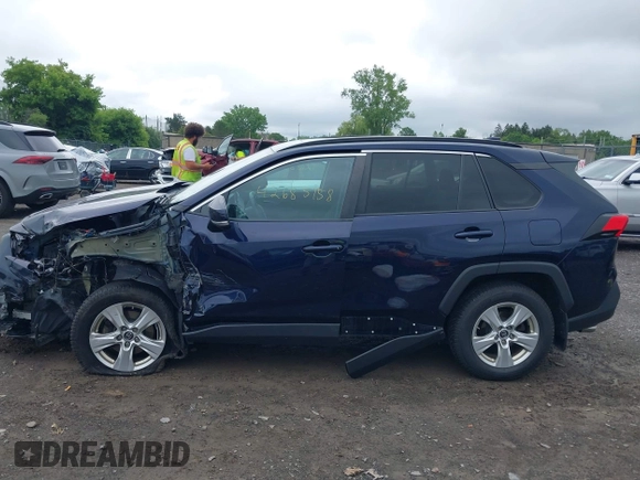 2019 Toyota RAV4 XLE with VIN 2T3P1RFVXKC057616, listed as a IAAI auction lot 42685158 with 148,661 mi miles and . Bid and sale history available at DreamBid. Image 15.