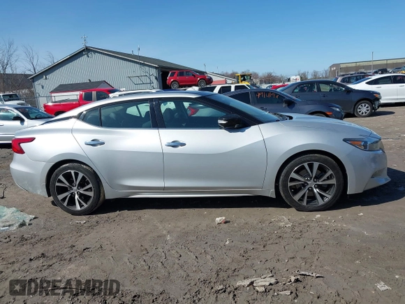 2018 Nissan Maxima S with VIN 1N4AA6AP0JC408701, listed as a IAAI auction lot 41941255 with 49,054 mi miles and . Bid and sale history available at DreamBid. Image 13.
