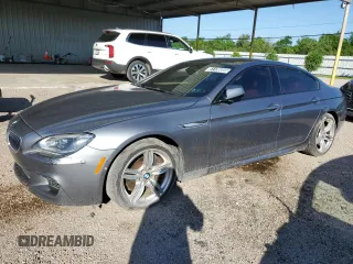 2014 BMW 6 Series 650i xDrive z VIN WBA6B4C53ED371461, wystawiony jako Copart lot #51136055 z przebiegiem 143 213 mil mil oraz Tytuł czysty. Historia ofert i sprzedaży dostępna na DreamBid. Obrazek 1.