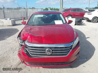 2021 Volkswagen Passat 2.0T SE with VIN 1VWSA7A30MC007748, listed as a IAAI auction lot 41843136 with 34,467 mi miles. Bid and sale history available at carsss.com. Image 6.