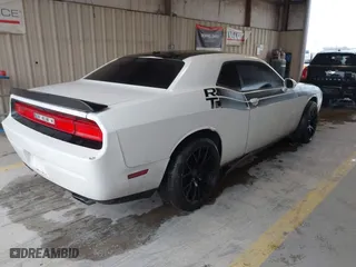 2011 Dodge Challenger with VIN 2B3CJ4DGXBH558348, listed as a IAAI auction lot 41532603 with 127,551 mi miles. Bid and sale history available at carsss.com. Image 4.